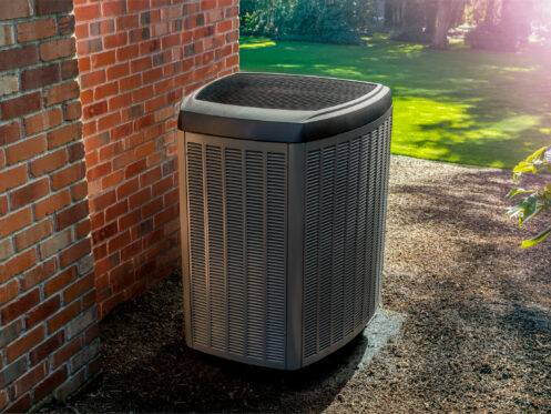 An AC system in the backyard of a Pensacola home.